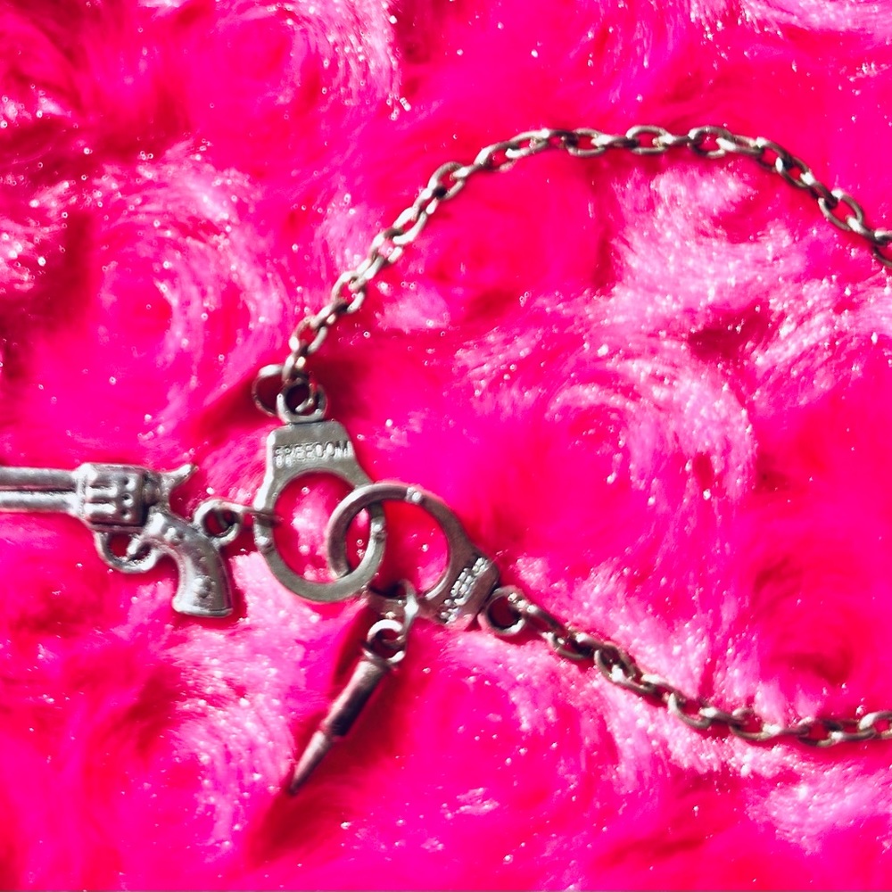 Cuffs, Gun and bullet necklace